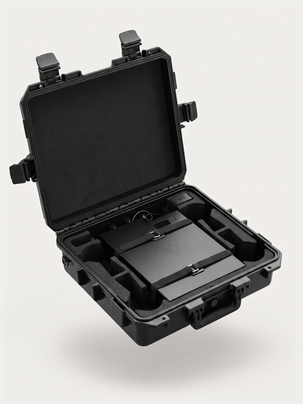 Open travel case with VBAT45 battery, cable, and accessory tray